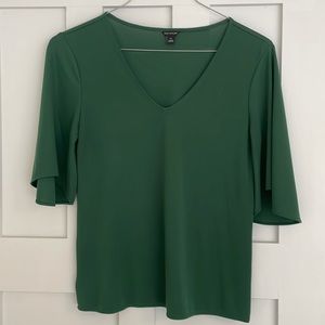 Green short sleeved, blouse. XS.
